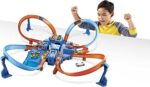 Hot Wheels DTN42, Trackset, mit Rampen, Kreuzungen und Looping, Parkplätzen, + 1 Fahrzeug, Spielzeug Autorennbahn ab 5 Jahren – Bild 3