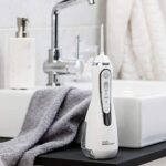 Waterpik Cordless Advanced Waterflosser kabellose Munddusche mit 4 Aufsätzen, Druckbereich von 3,1 bis 5,2 regulierbar über 3 Druckeinstellungen, mit Induktionsladesystem – Bild 6