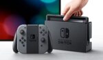 Nintendo Switch Konsole mit einem Paar grauer Joy-Con – Bild 5