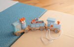 Kindsgut Nachziehzug aus Holz mit Zootieren – 12-teiliges Lernspielzeug für Kleinkinder – Bild 9