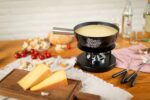 KUHN RIKON Käsefondue Set Alpenliebe 22cm – Komplettes Aluminium Fondue für Induktion – Bild 3