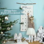 Papierdrachen Adventskalender 2026 – Bestickter Wandteppich 120x60 cm mit 24 Stoffbeutel – Bild 5