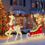 DELICHTER Rentier mit Schlitten 107 cm – 117 LED Warmweiss mit Musik & Bewegungsmelder