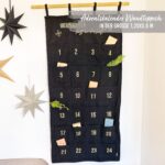 Papierdrachen Adventskalender 2026 – Bestickter Wandteppich Schwarz-Gold 120x60 cm – Bild 2