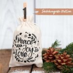 Papierdrachen Adventskalender 2026 – 24 Stoffsäckchen mit Holzklammern & Juteband – Bild 3