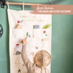 Papierdrachen Adventskalender 2026 – Bestickter Wandteppich Beige & Gold 120x60 cm – Bild 6
