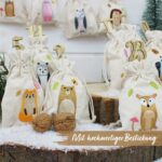 Papierdrachen Adventskalender 2026 – 24 bestickte Stoffsäckchen Waldtiere mit Glitzer-Zahlenklammern – Bild 3
