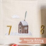 Papierdrachen Adventskalender 2026 – Bestickter Wandteppich Beige & Gold 120x60 cm – Bild 5